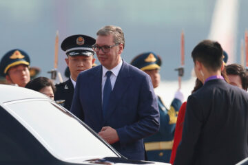 Serbia’s President Aleksandar Vucic, center, arrives at the Beijing Capital International Airport in Beijing Tuesday, Sept. 2, 2025. (Lintao Zhang/Pool Photo via AP)