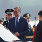Serbia’s President Aleksandar Vucic, center, arrives at the Beijing Capital International Airport in Beijing Tuesday, Sept. 2, 2025. (Lintao Zhang/Pool Photo via AP)