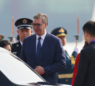 Serbia’s President Aleksandar Vucic, center, arrives at the Beijing Capital International Airport in Beijing Tuesday, Sept. 2, 2025. (Lintao Zhang/Pool Photo via AP)